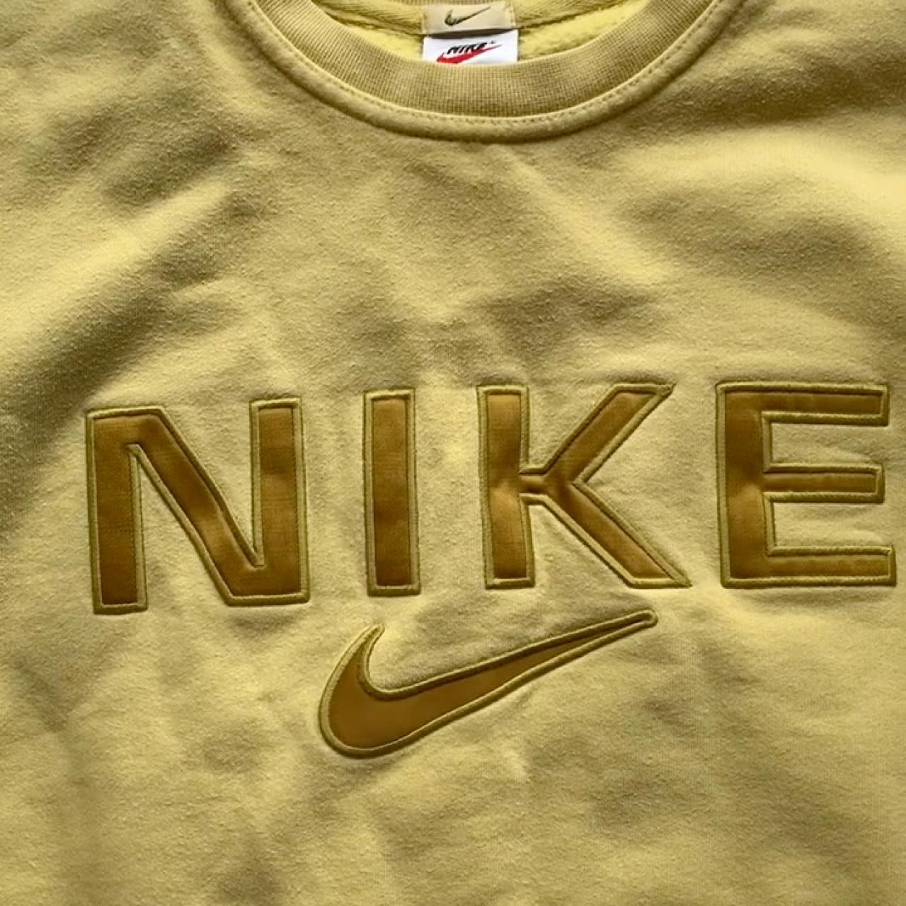 womens yellow nike shirt