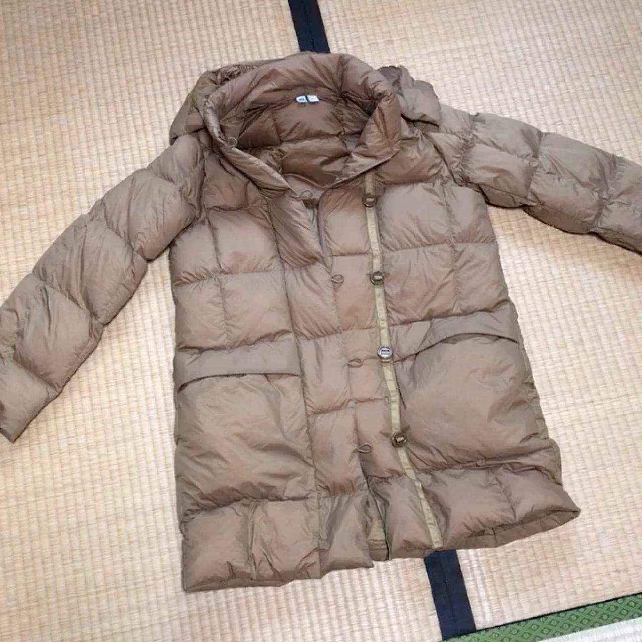 Uniqlo long quilted down puffer jacket in tan. Comes... - Depop