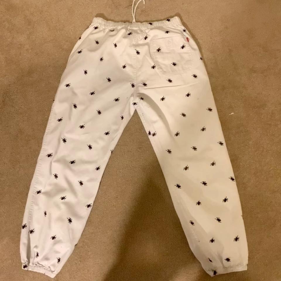 Supreme Men's White and Black Trousers | Depop