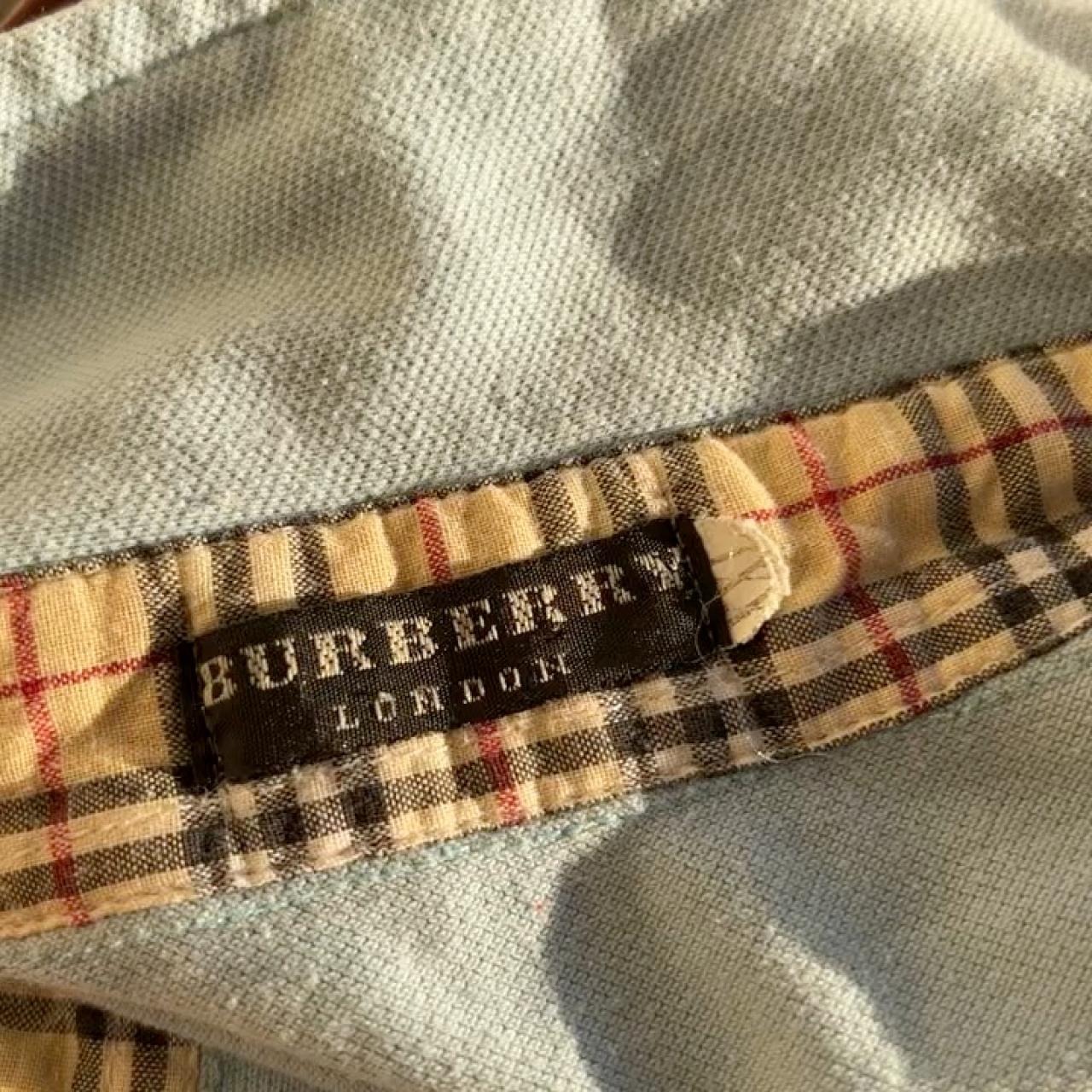 Burberry Women's Blue T-shirt | Depop