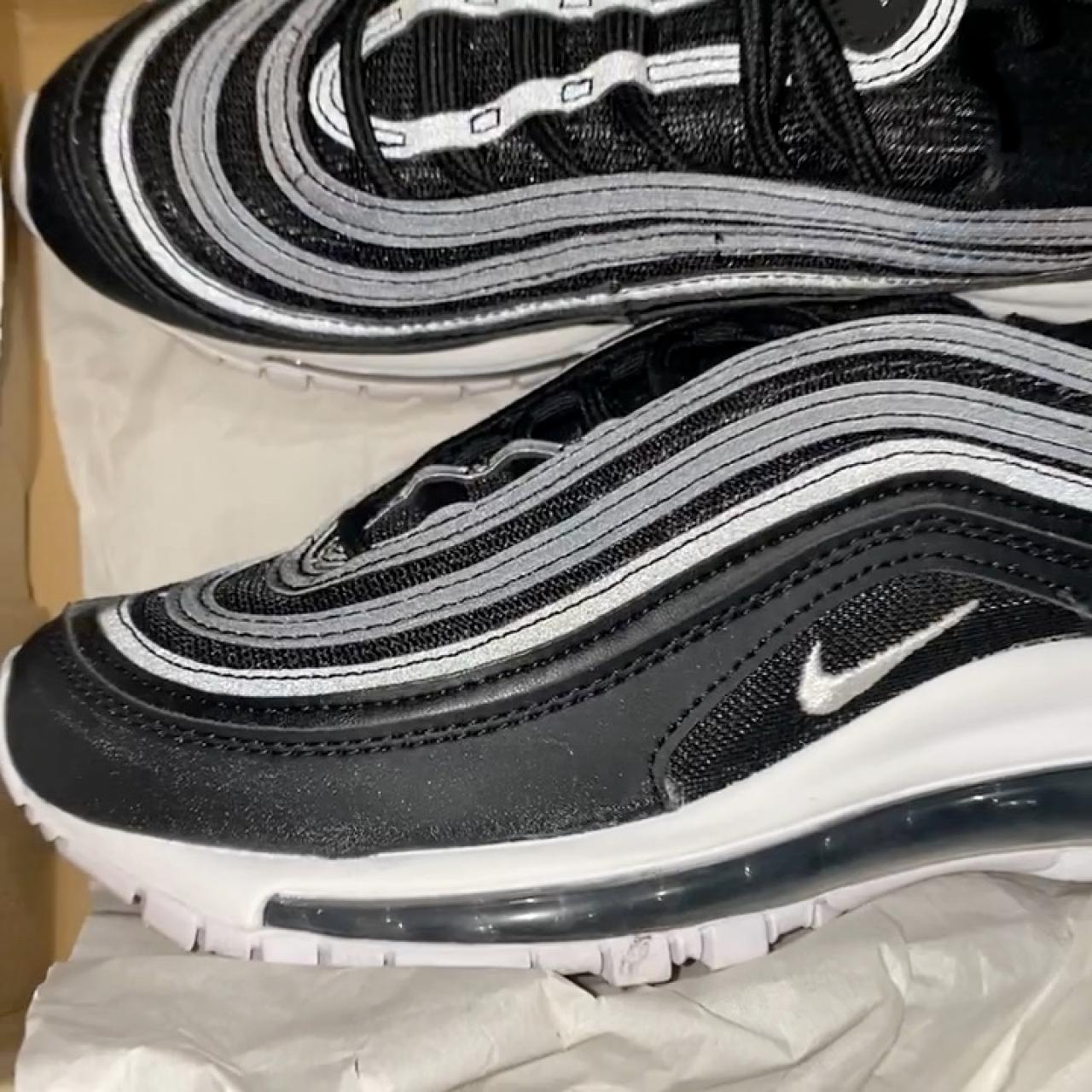 black 97s size 4