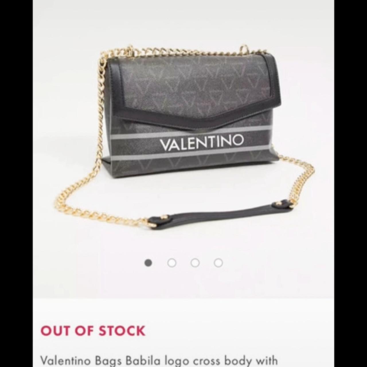 Valentino cross body bag with gold chain strap with... Depop