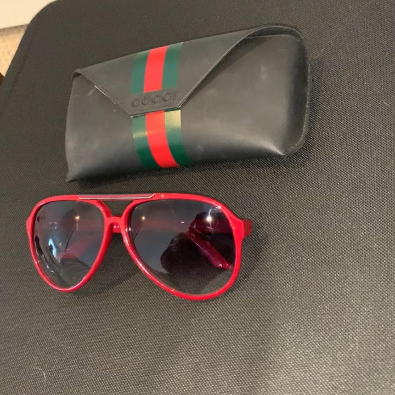 Gucci aviator sunglasses in red. G 