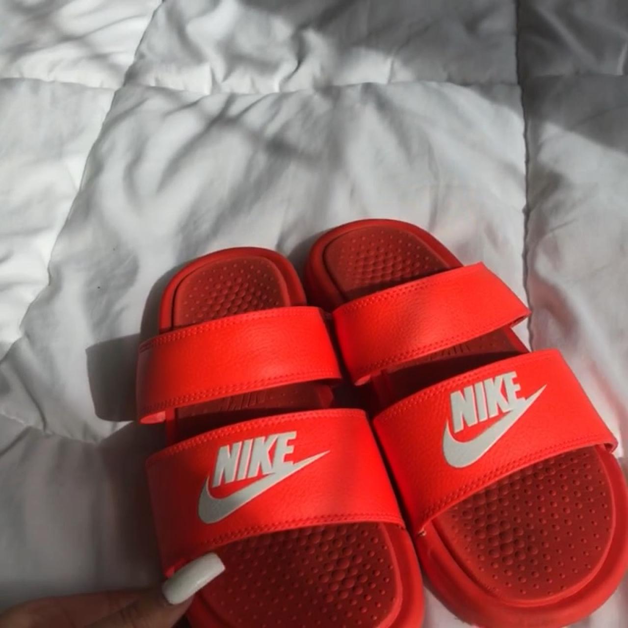 blue and red nike slides