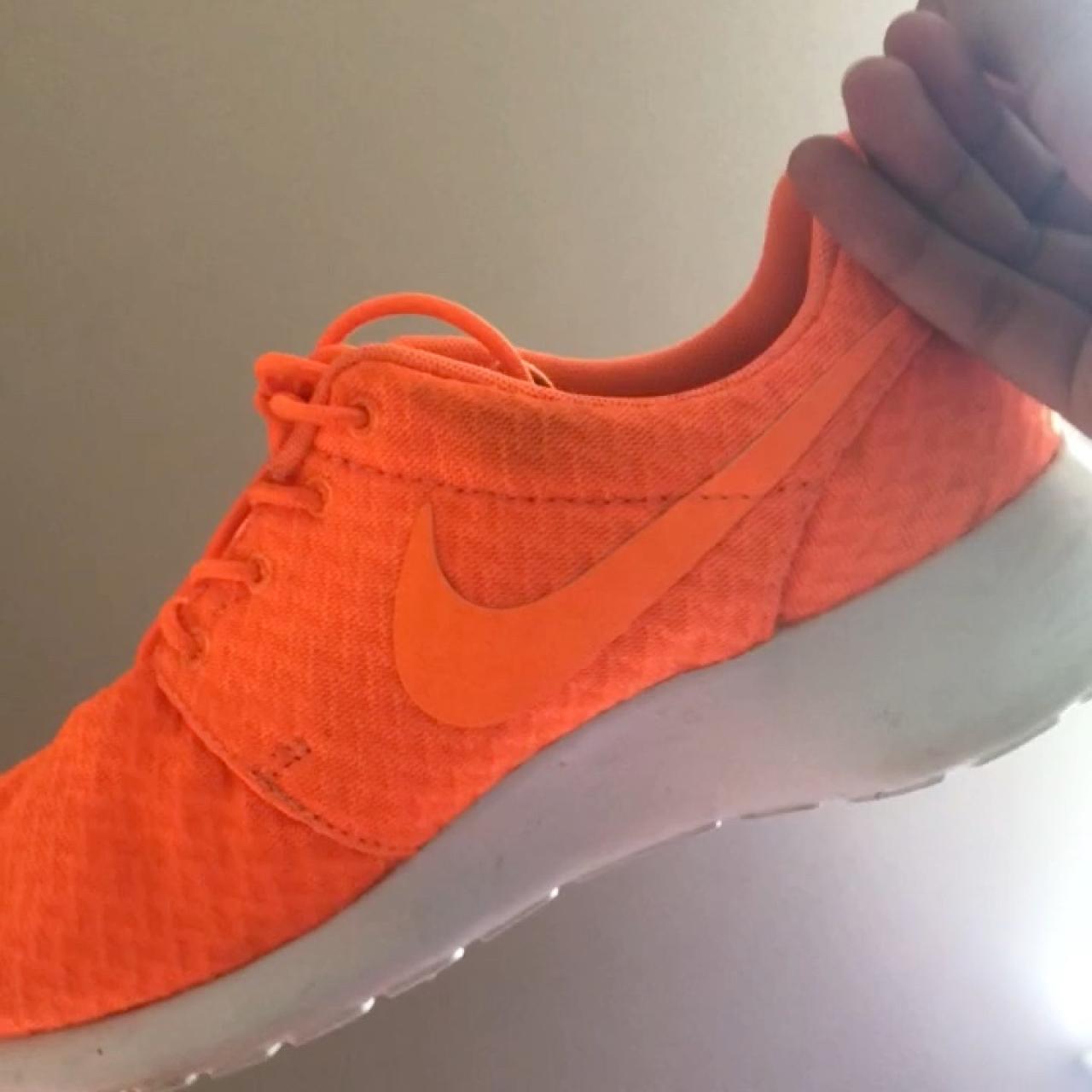 neon orange nike roshe