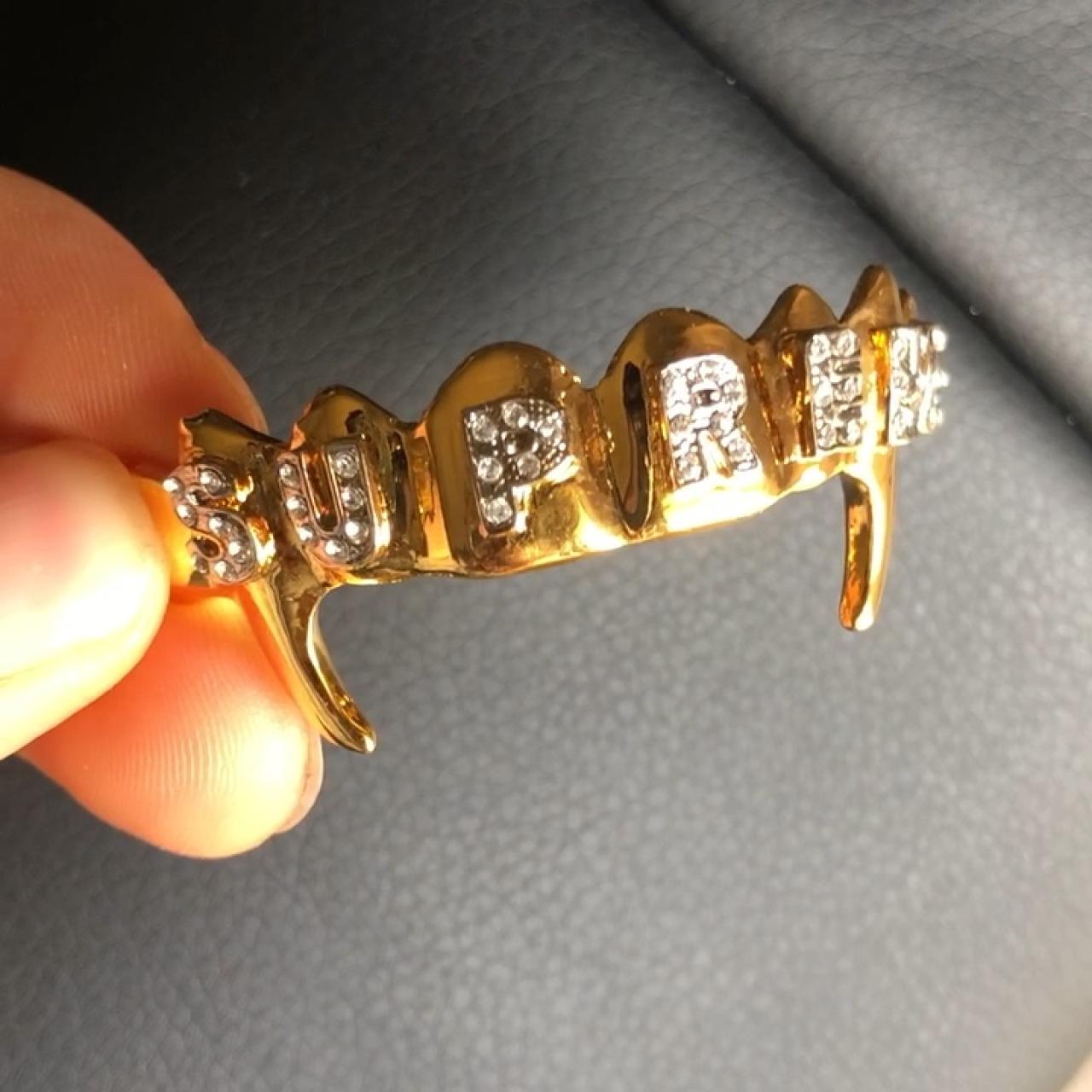 Supreme Fronts Keychain 24k gold plated grill... - Depop