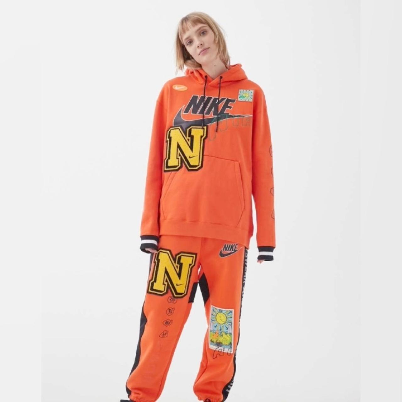 orange and black nike sweatsuit