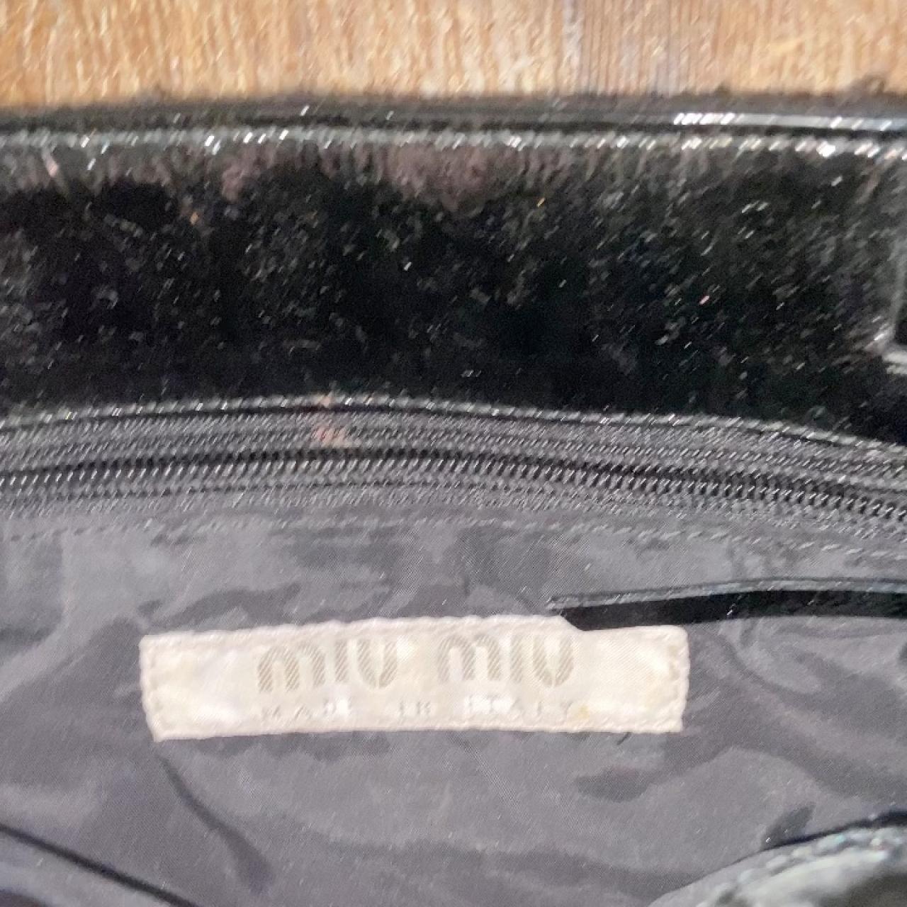 mui mui black shoulder bag this bag is vintage and... Depop
