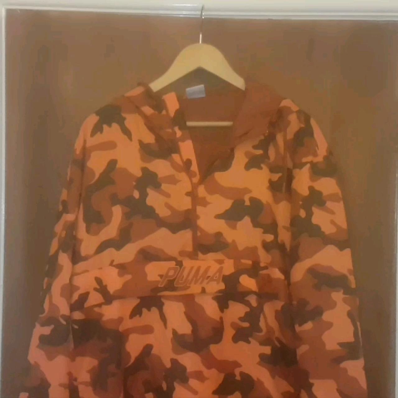 puma pullover windbreaker in camo print in orange