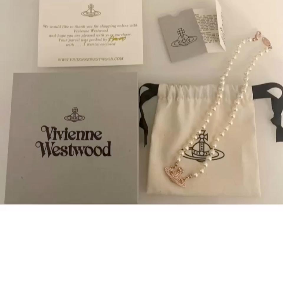 Seller sent me this card when I asked about the authenticity of a Vivienne  Westwood orb necklace. Can this card be used as means of authentication?  Thank you : r/Depop