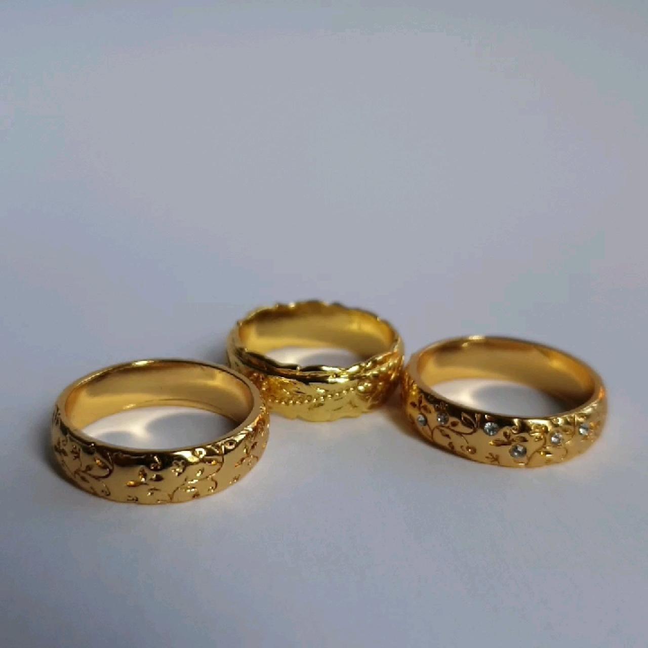 Gold coloured engraved rings in size O and... Depop