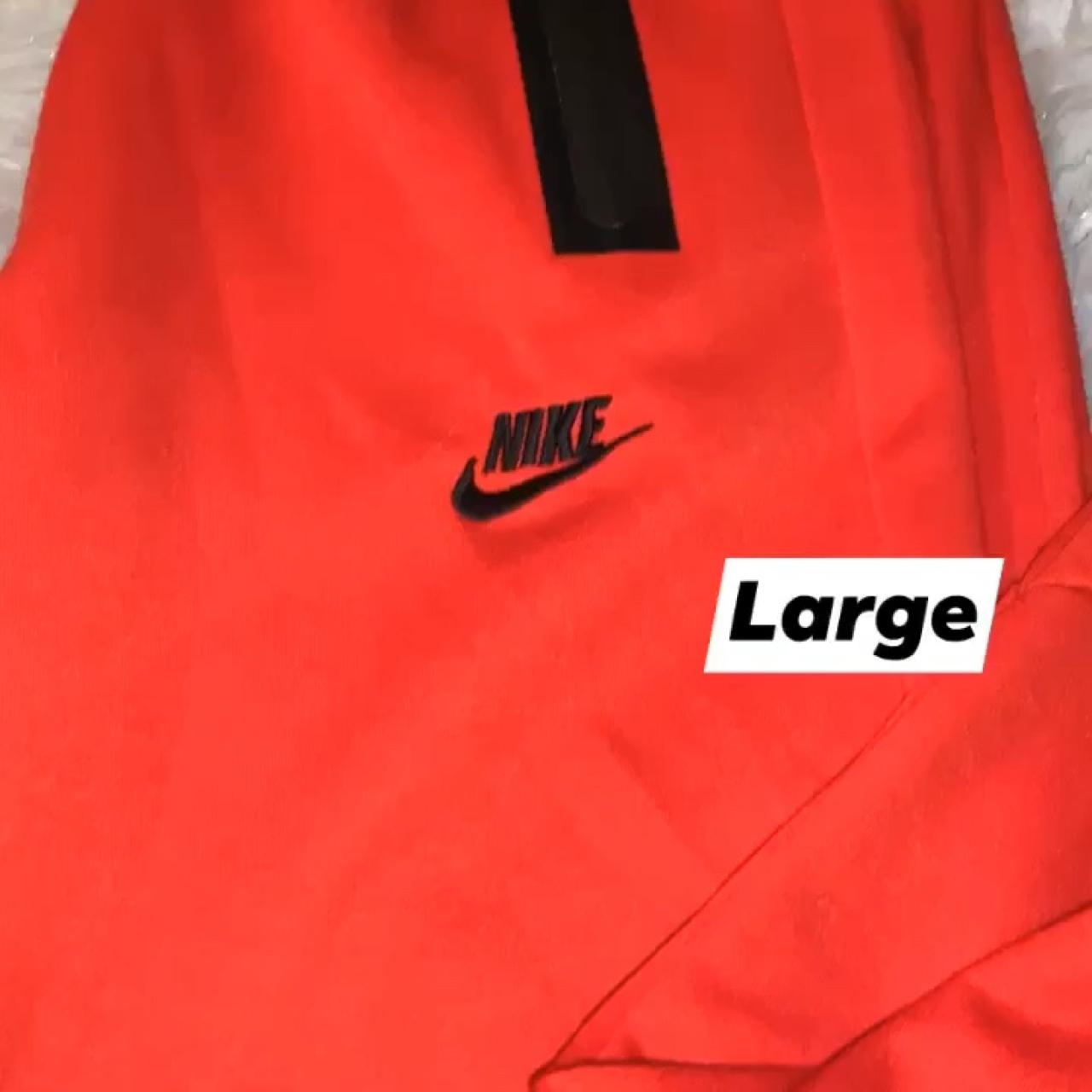 black and red nike jumpsuit