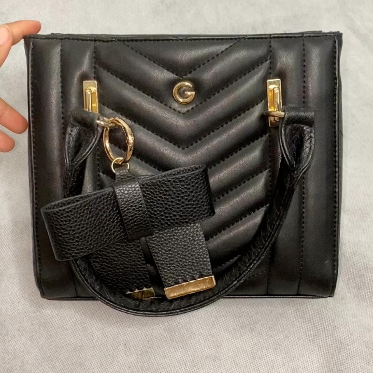 Guess mini crossbody bag. Bag is a black faux... Depop