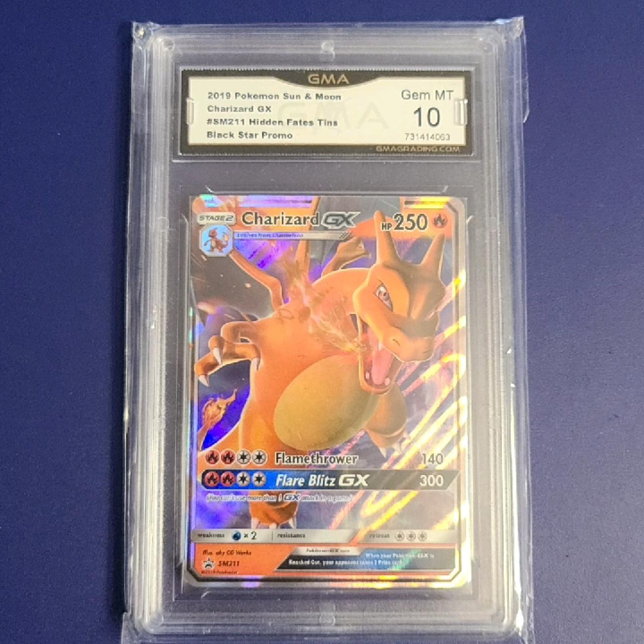 GMA POKÉMON HALOGRAM 2019 CHARIZARD GX 250HP #SM211... | Depop display picture 1