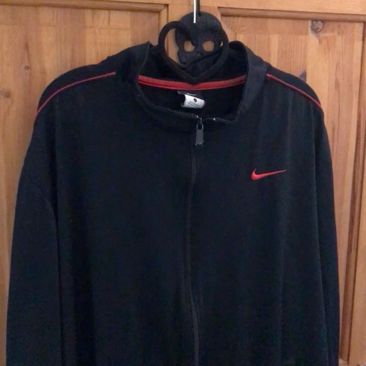 red and black nike coat